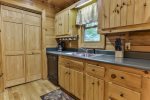Counter space to make any meal in this cottage style kitchen
